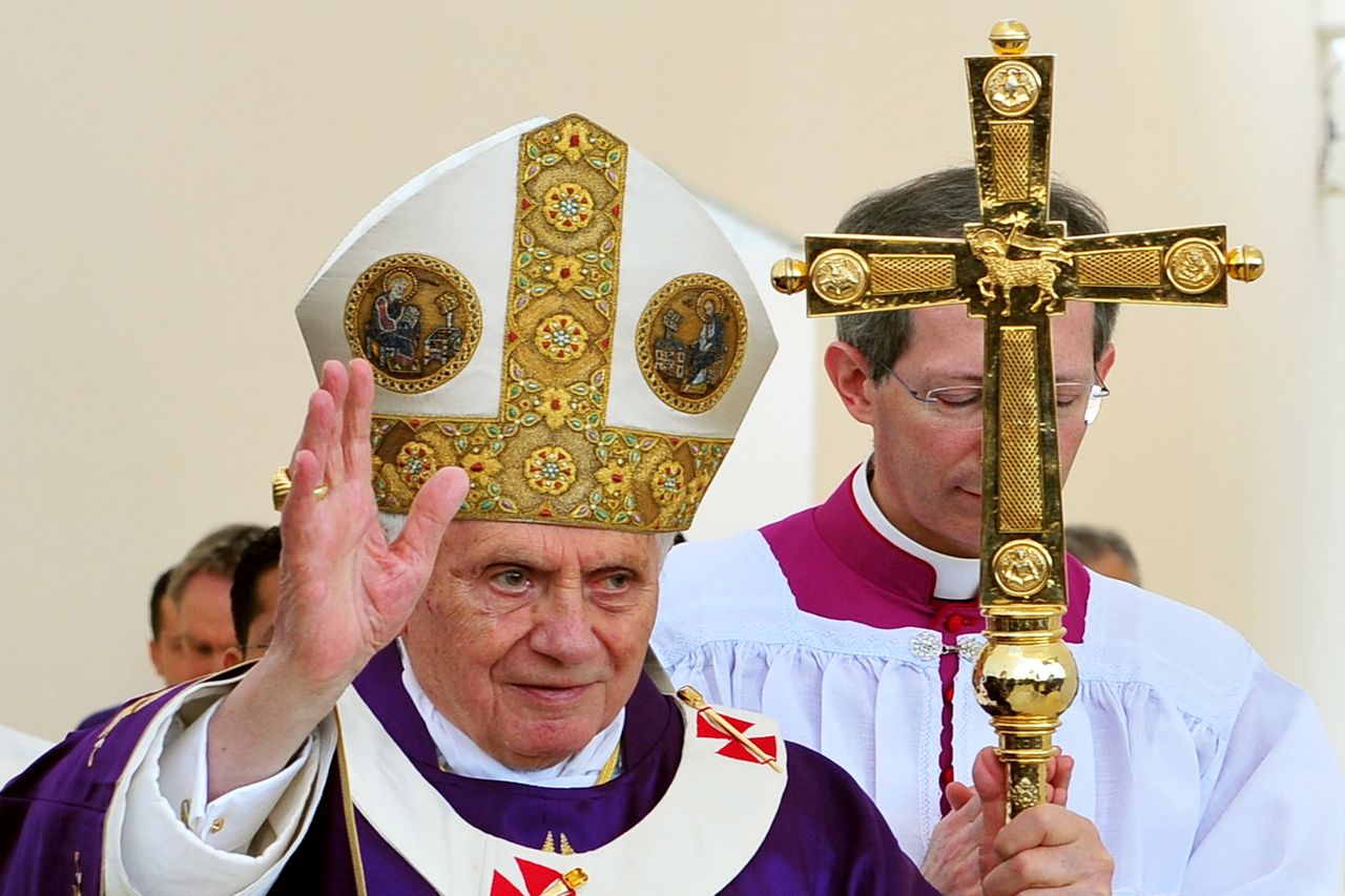 Pope Benedict XVI salutes as he arrives