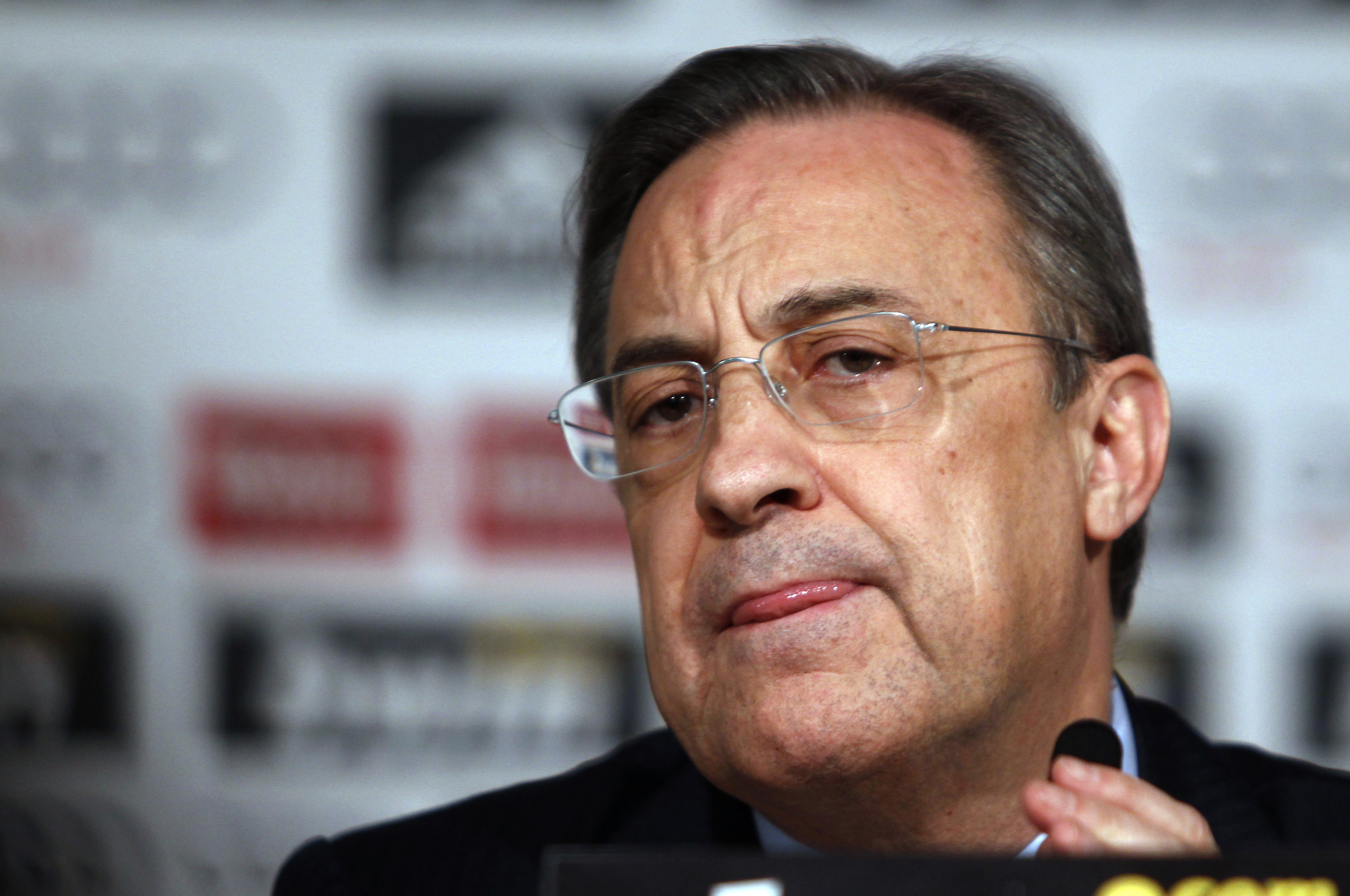 Real Madrid president Perez listens to a question at a news conference in Madrid