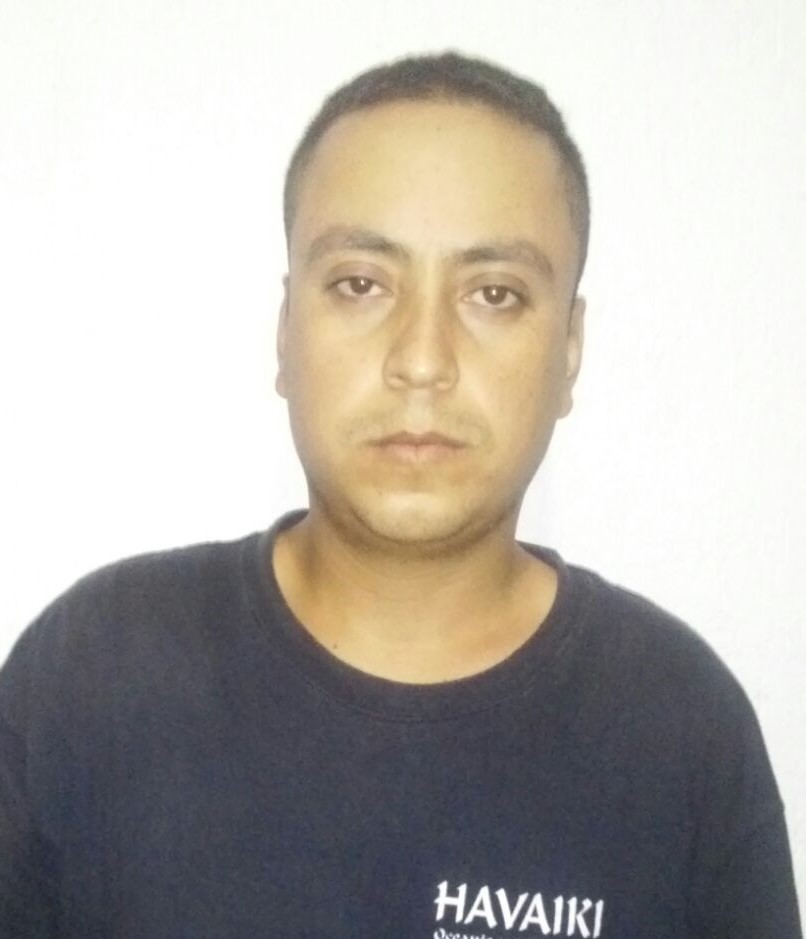 Juan Bernardo Franco Franco, policía municipal de Cancún detenido junto con narcos.
